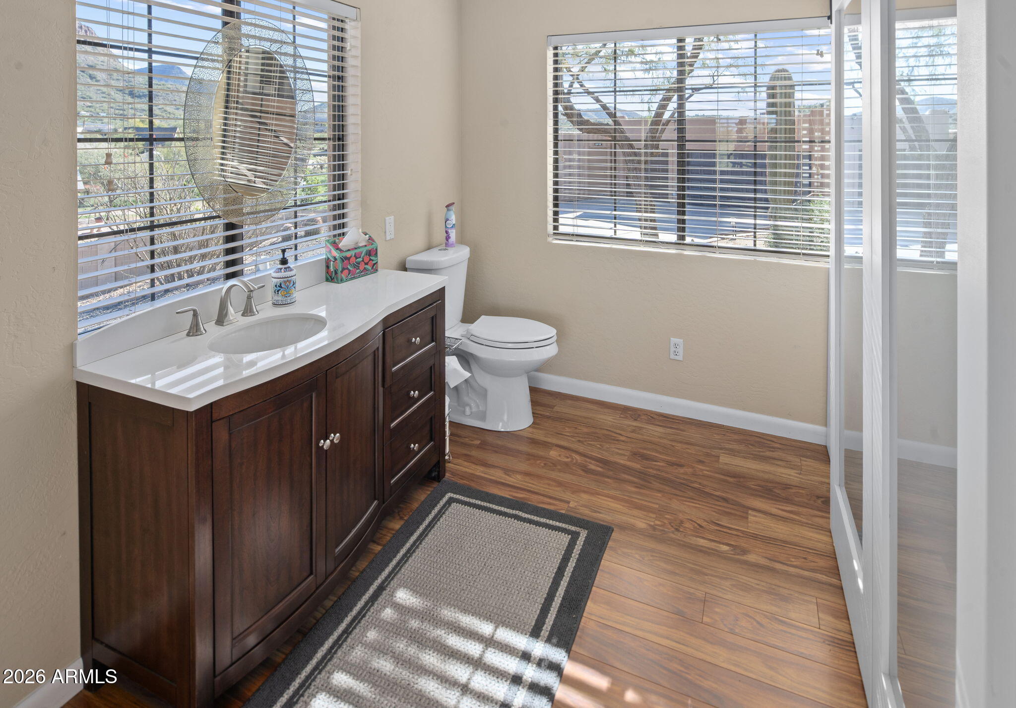 42331 North 3rd Street Phoenix, AZ 85086 - Photo 29 of 52 a bathroom with a sink double vanity and a toilet