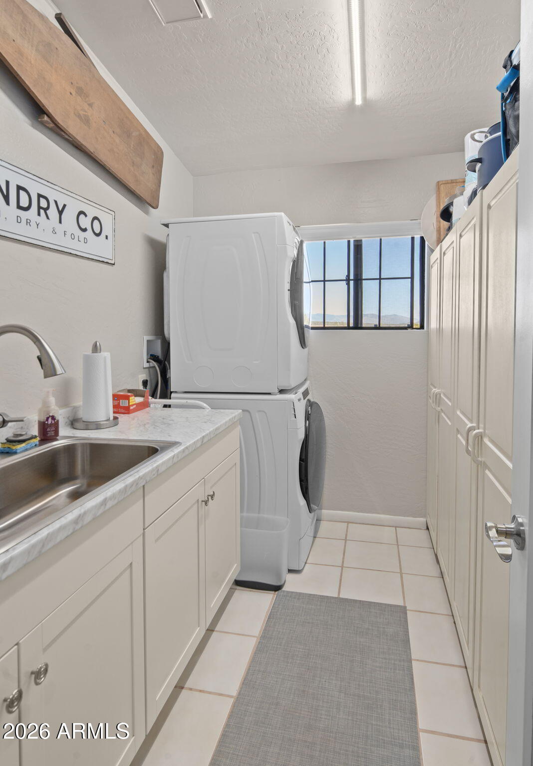 42331 North 3rd Street Phoenix, AZ 85086 - Photo 30 of 52 a bathroom with a sink a toilet and mirror