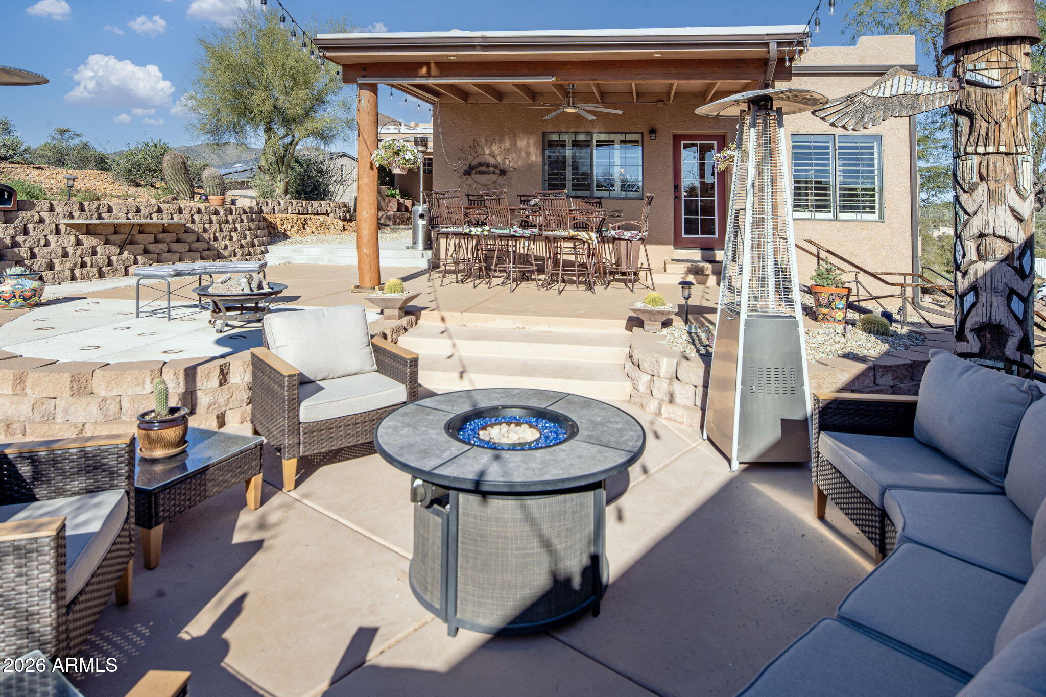 42331 North 3rd Street Phoenix, AZ 85086 - Photo 35 of 52 a living room with furniture a rug and a fireplace