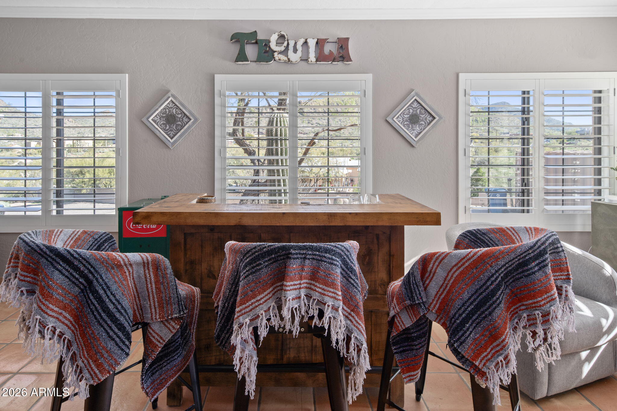 42331 North 3rd Street Phoenix, AZ 85086 - Photo 10 of 52 a view of a dining room with furniture and windows