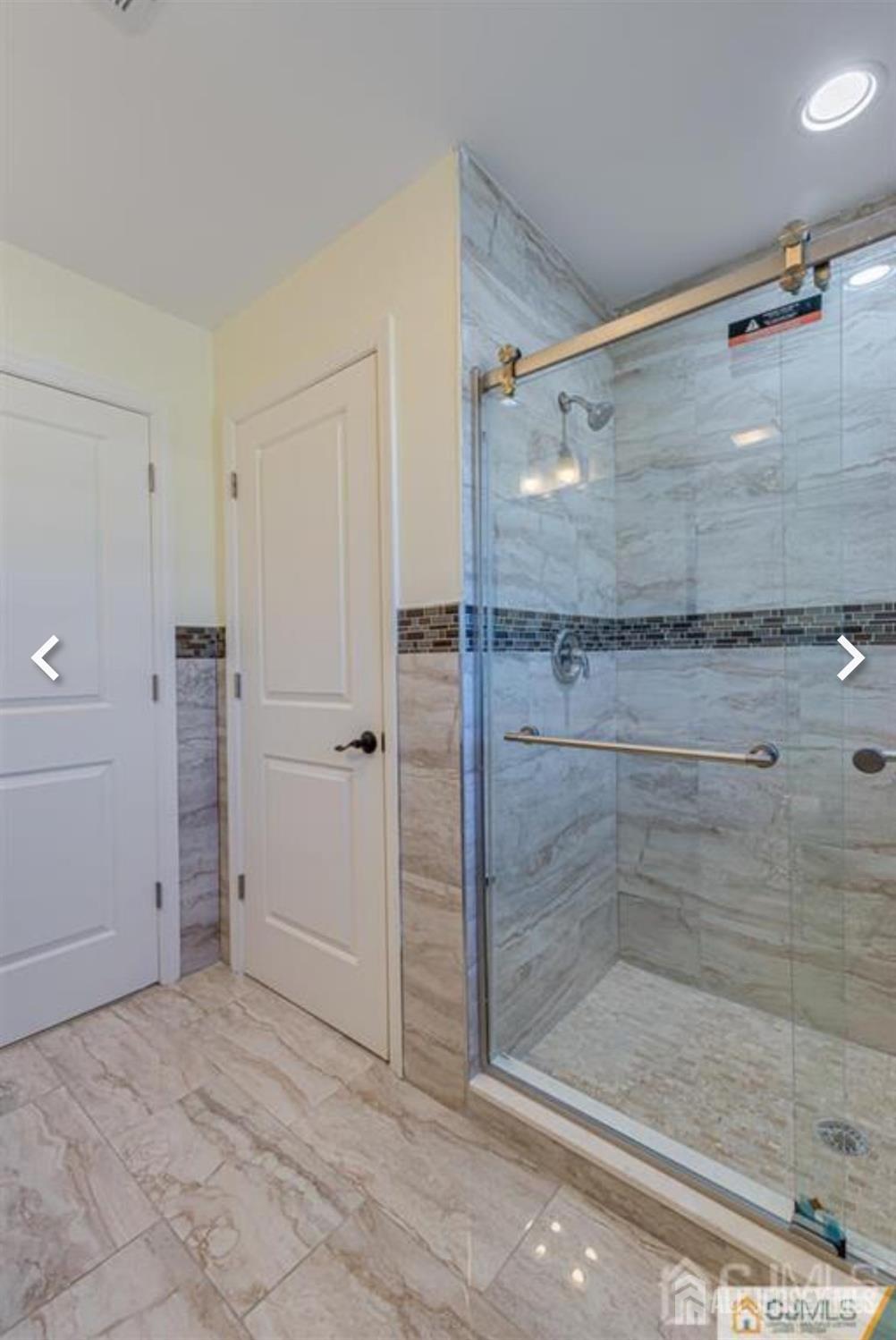 19 Henry Street Edison, NJ 08820 - Photo 11 of 33 a bathroom with a shower