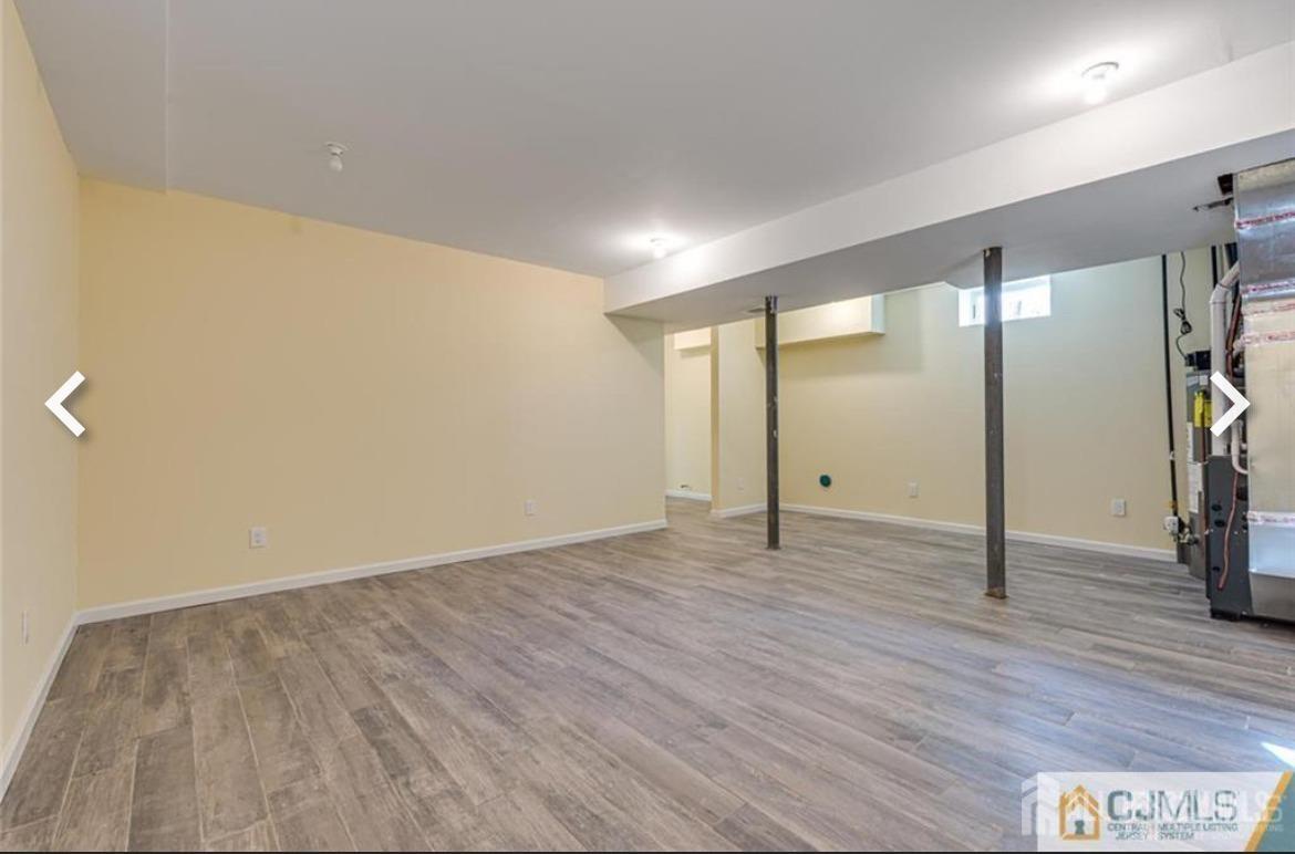 19 Henry Street Edison, NJ 08820 - Photo 10 of 33 a view of empty room with wooden floor