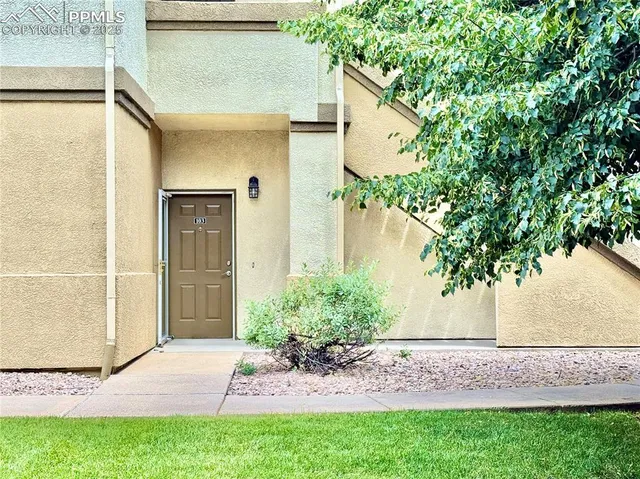a view of a backyard of the house