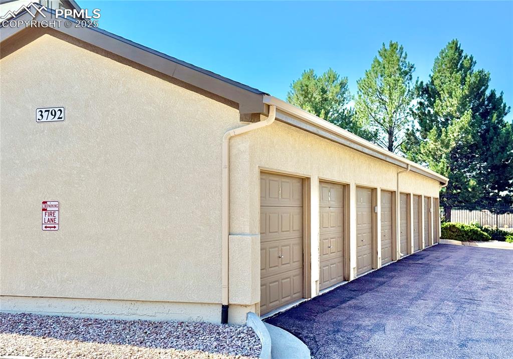 3764 Riviera Grove, Unit 103 Colorado Springs, CO 80922 - Photo 21 of 25 a view of a backyard