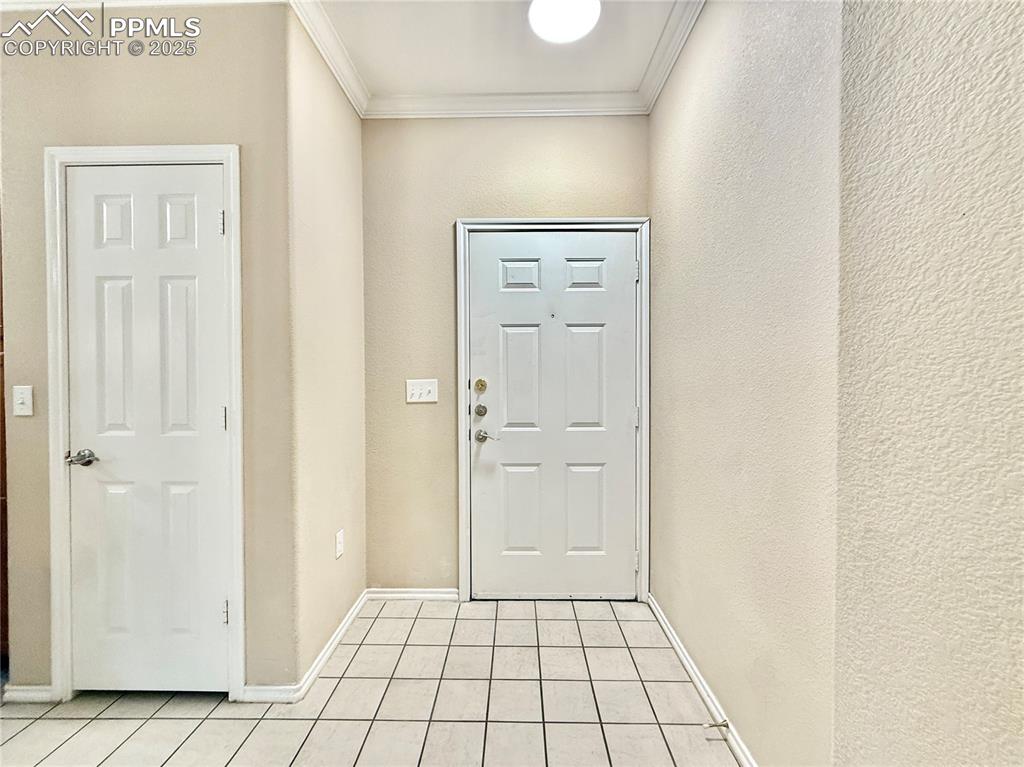 3764 Riviera Grove, Unit 103 Colorado Springs, CO 80922 - Photo 3 of 25 an empty room with windows