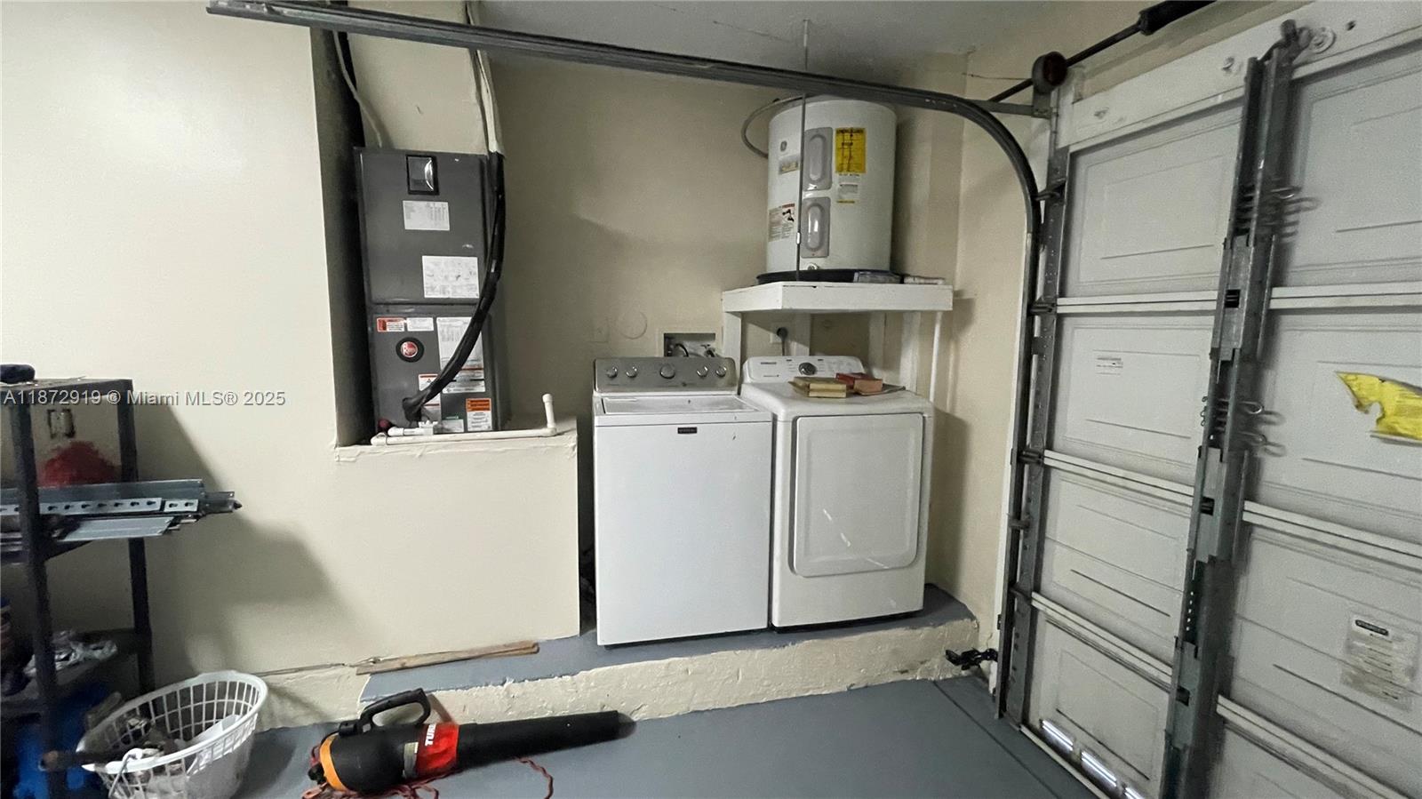 6952 Southwest 148 Lane Davie, FL 33331 - Photo 28 of 100 a utility room with dryer and washer