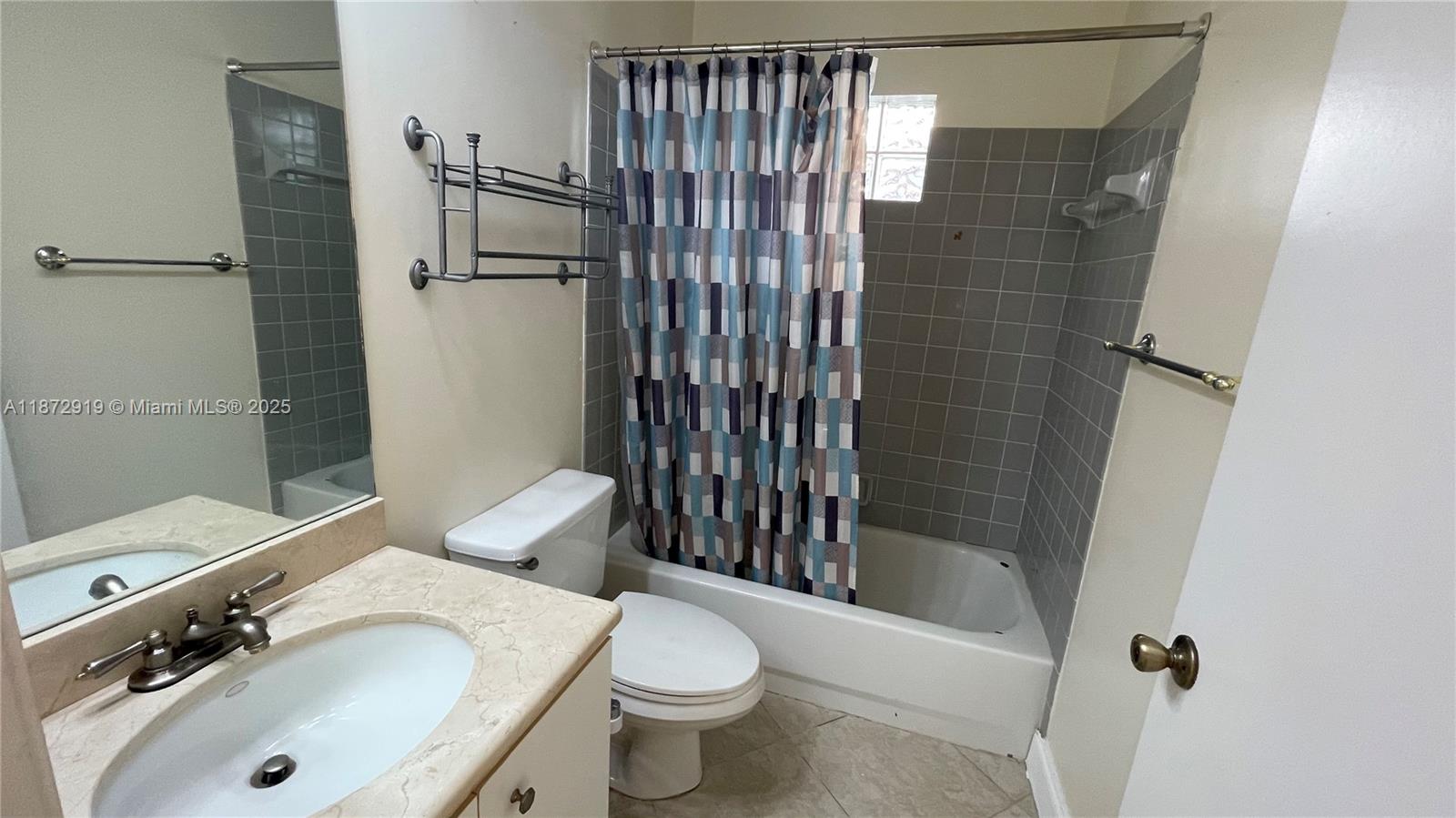 6952 Southwest 148 Lane Davie, FL 33331 - Photo 66 of 100 a bathroom with a sink toilet and shower