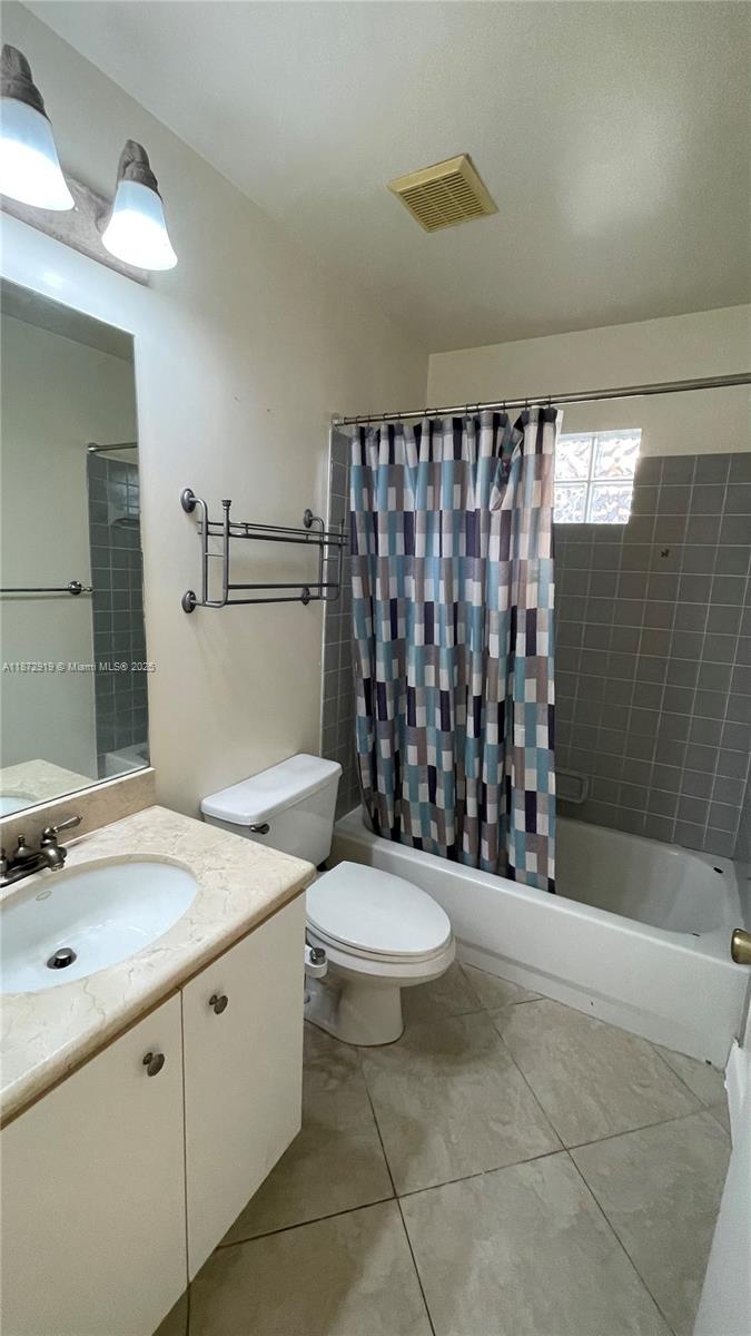 6952 Southwest 148 Lane Davie, FL 33331 - Photo 81 of 100 a bathroom with a sink a toilet and shower