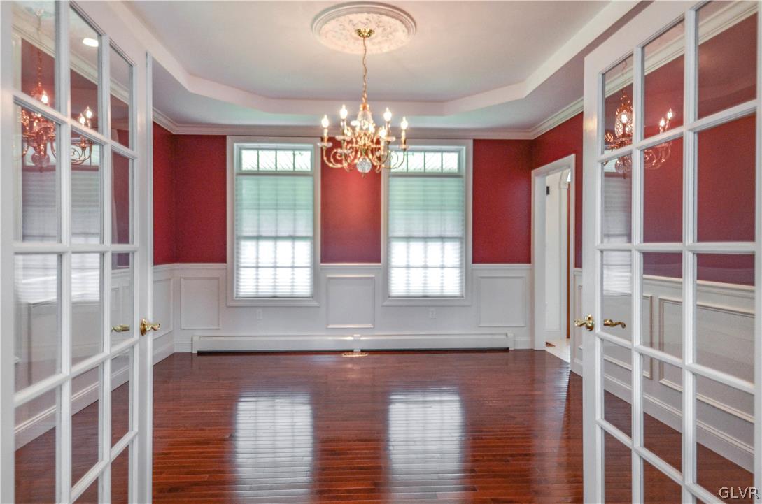 2359 Wehr Mill Road Allentown, PA 18104 - Photo 13 of 50 a view of a room with windows and chandelier