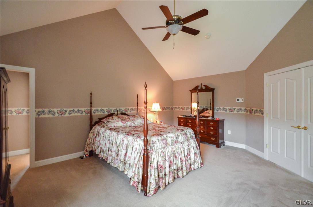 2359 Wehr Mill Road Allentown, PA 18104 - Photo 19 of 50 a bed room with a bed and a ceiling fan
