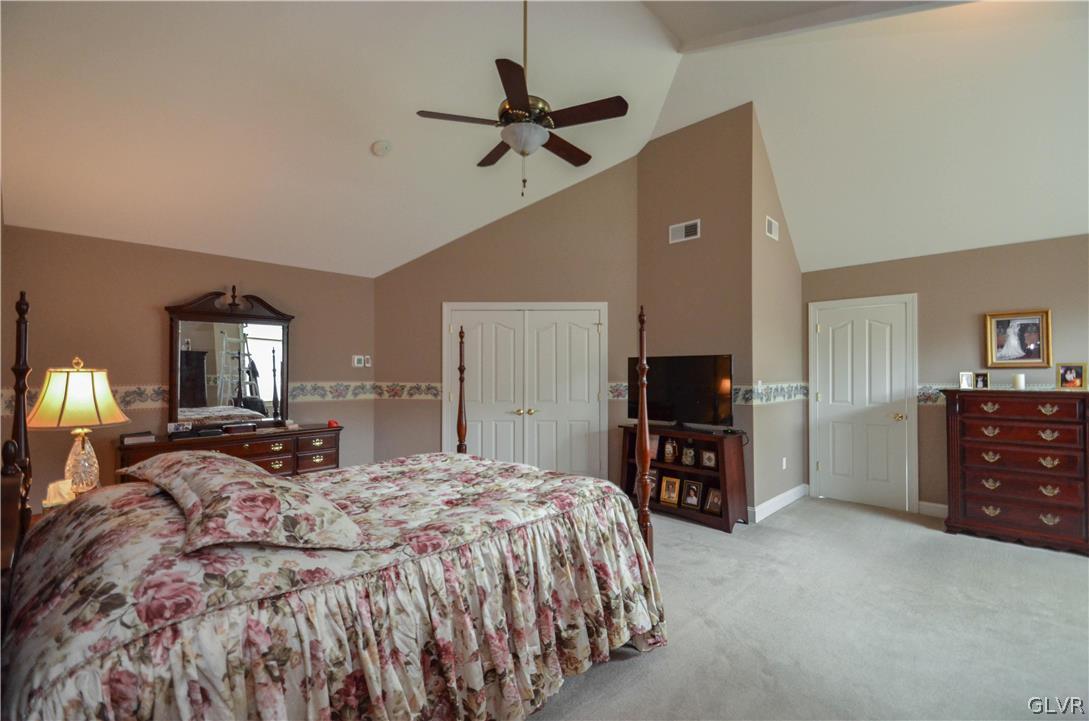 2359 Wehr Mill Road Allentown, PA 18104 - Photo 20 of 50 a bedroom with a large bed and a tv