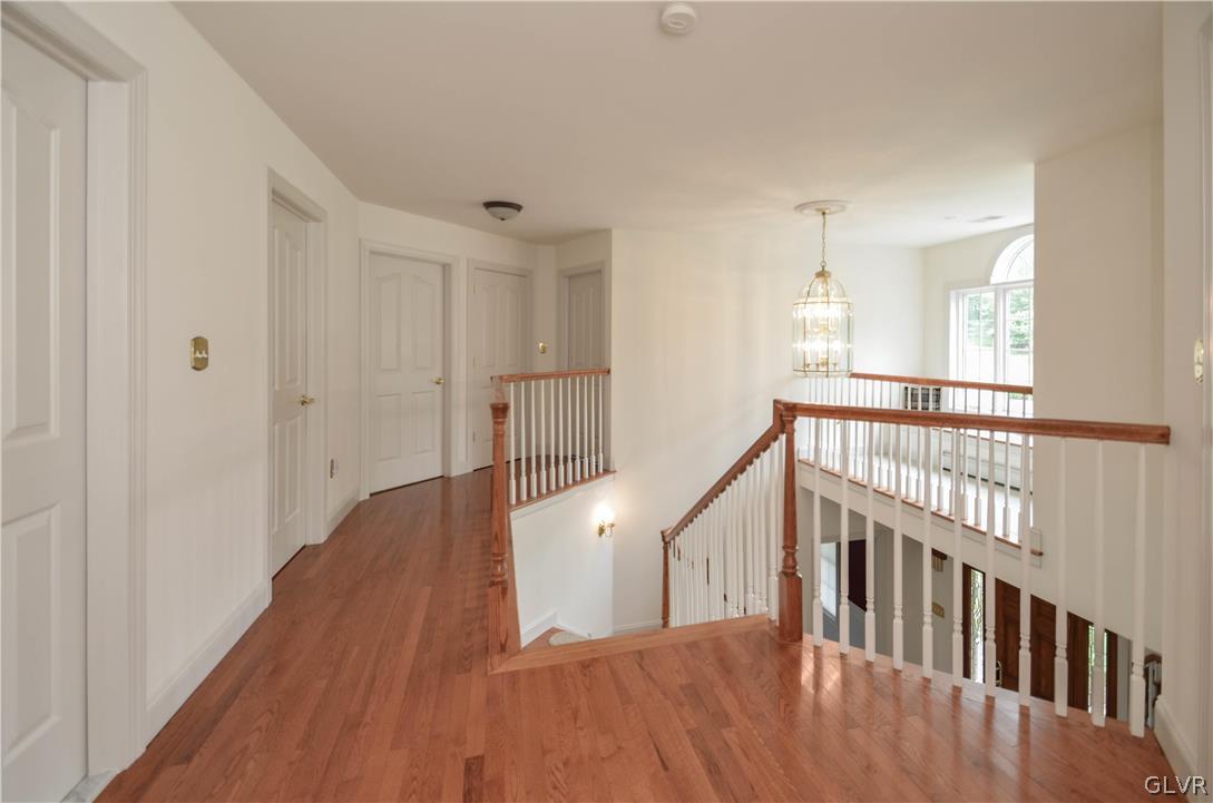 2359 Wehr Mill Road Allentown, PA 18104 - Photo 24 of 50 a view of a hallway with wooden floor and entryway