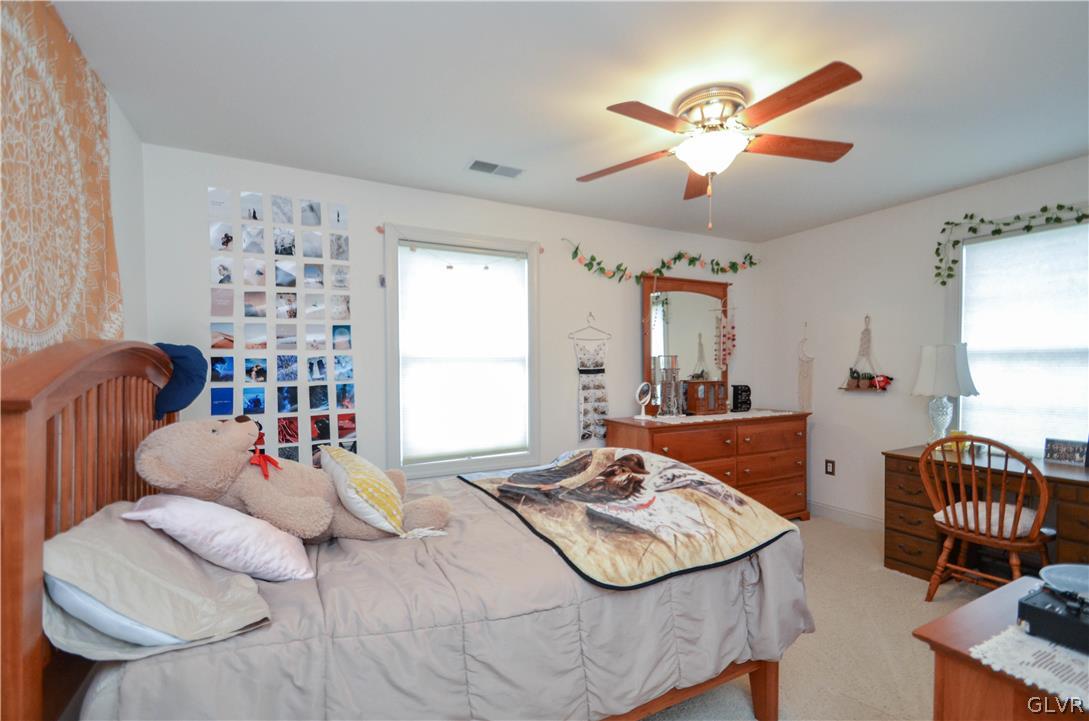 2359 Wehr Mill Road Allentown, PA 18104 - Photo 27 of 50 a bedroom with furniture and a large window