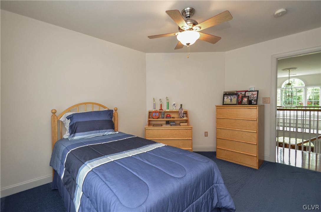 2359 Wehr Mill Road Allentown, PA 18104 - Photo 29 of 50 a bedroom with a bed and a dresser