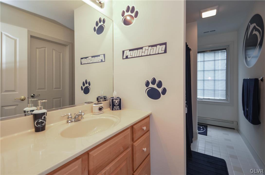 2359 Wehr Mill Road Allentown, PA 18104 - Photo 31 of 50 a bathroom with a sink and a mirror