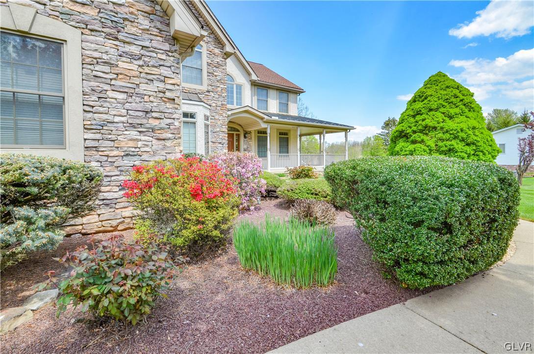 2359 Wehr Mill Road Allentown, PA 18104 - Photo 40 of 50 a front view of a house with garden