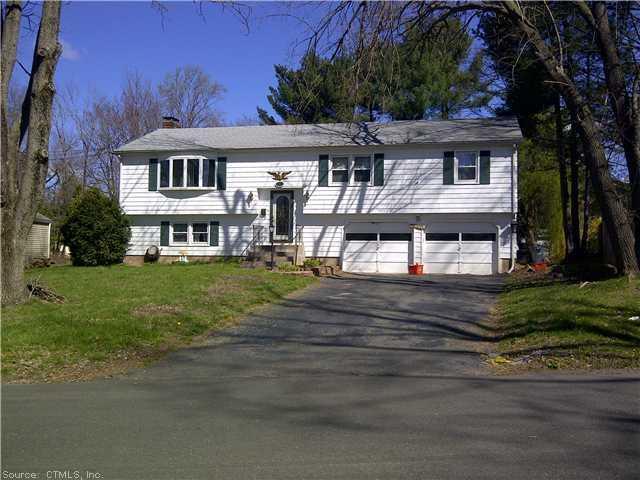 8 Scarborough Road Windsor, CT 06095 - Photo 1 of 1 front view of house with a yard