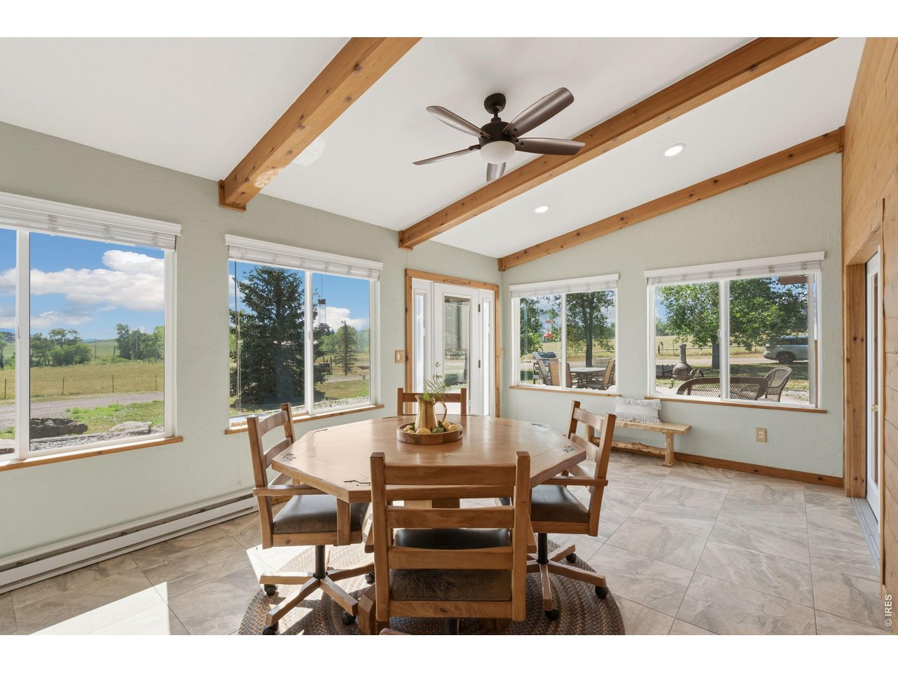 54 Rist View Road Bellvue, CO 80512 - Photo 3 of 50 Sun Room off Main Entry...tons of natural light!