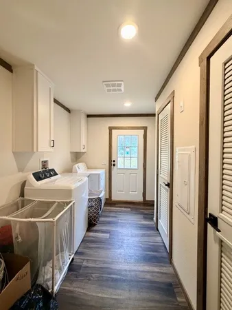 a room with a bed and a window