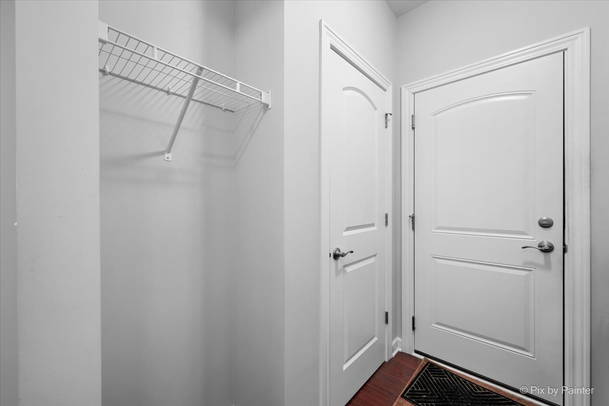 4375 Rudyard Kipling Road Elgin, IL 60124 - Photo 16 of 33 a view of walk in closet with empty racks