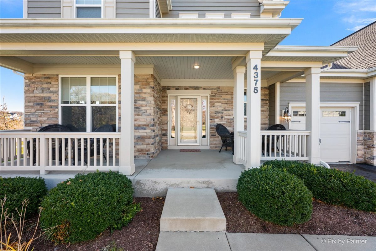 4375 Rudyard Kipling Road Elgin, IL 60124 - Photo 2 of 33 a view of a house with a garden