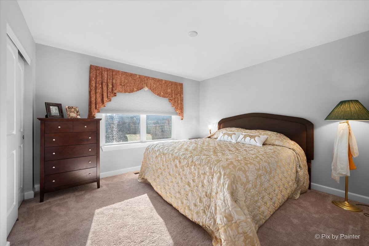 4375 Rudyard Kipling Road Elgin, IL 60124 - Photo 23 of 33 a bedroom with a bed and a window