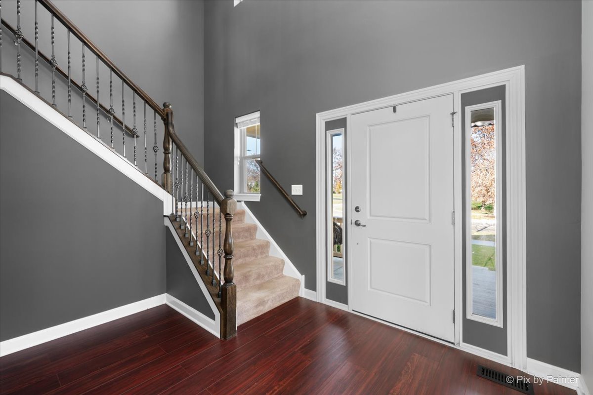4375 Rudyard Kipling Road Elgin, IL 60124 - Photo 3 of 33 a view of entryway with wooden floor