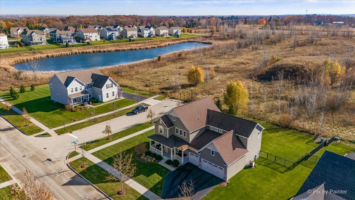 4375 Rudyard Kipling Road Elgin, IL 60124 - Photo 32 of 33 an aerial view of a house with a ocean view