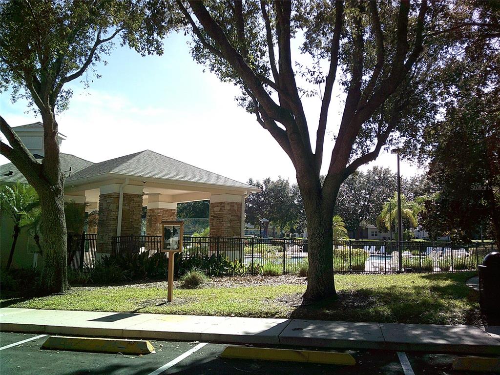 2735 Kingston Ridge Drive Clermont, FL 34711 - Photo 37 of 51 a front view of a house with garden