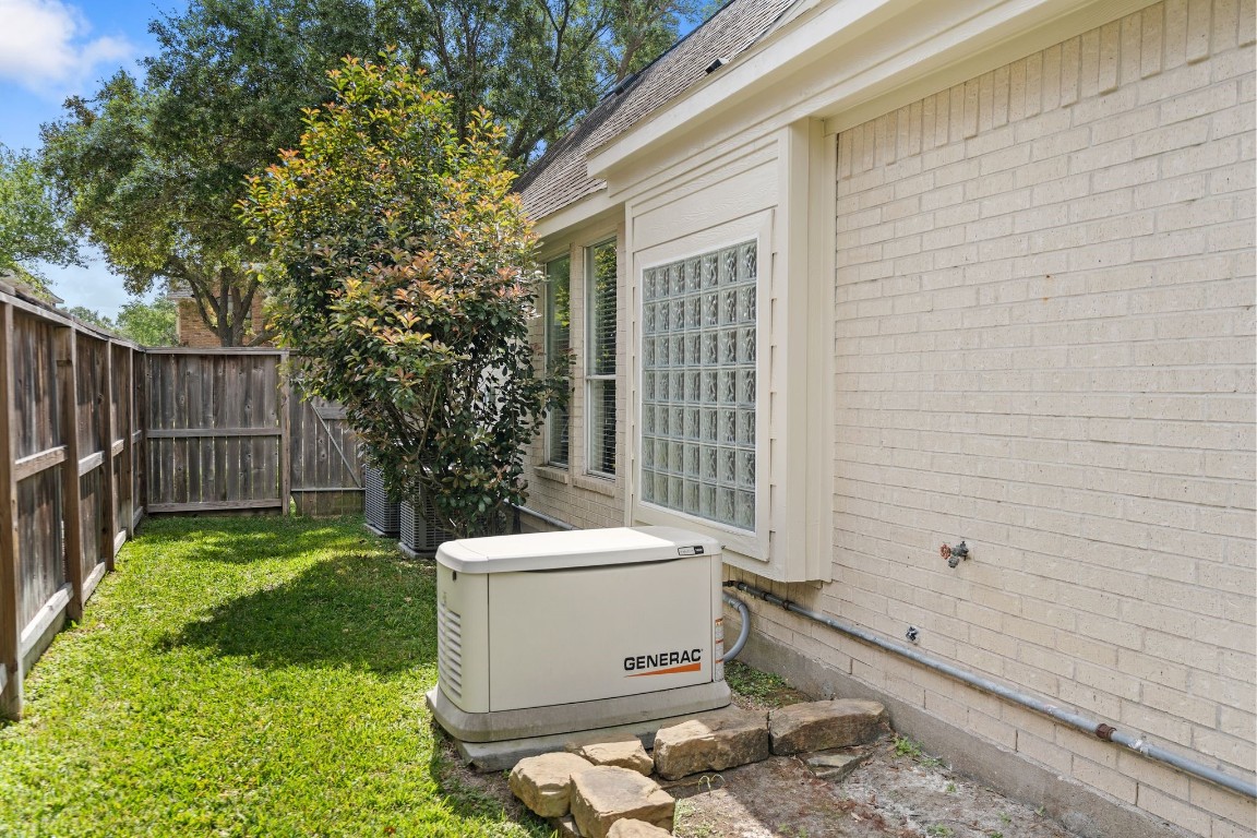 5515 Chase Harbor Houston, TX 77041 - Photo 12 of 48 Experience peace of mind with this whole home 24KW generator