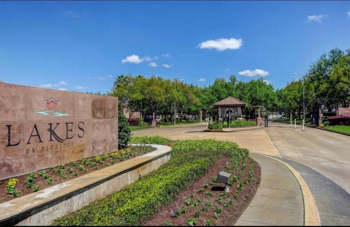 5515 Chase Harbor Houston, TX 77041 - Photo 39 of 48 Grand guard-gated entrance to Lakes on Eldridge, a prestigious master-planned community known for its scenic lakes, mature landscaping & resort-style amenities.