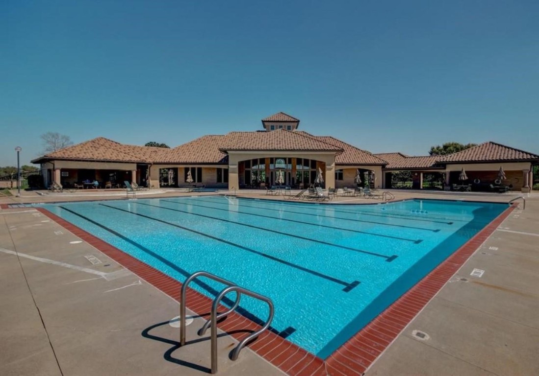 5515 Chase Harbor Houston, TX 77041 - Photo 44 of 48 Expansive lap pool with plenty of deck space provides a great spot for swimming, exercise & family fun.
