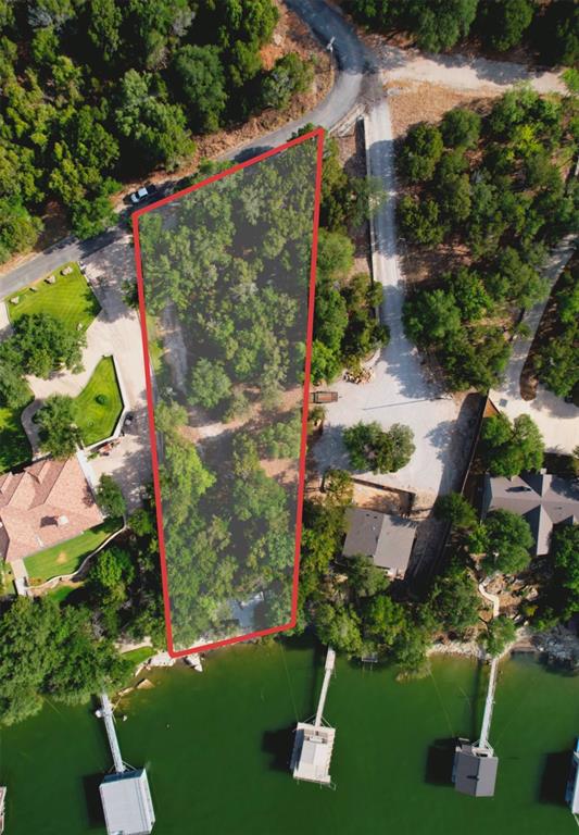an aerial view of residential house with outdoor space and swimming pool