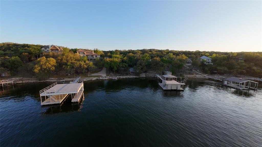 2217 Trl Rdg Road Graford, TX 76449 - Photo 2 of 9 a view of a lake with mountain view