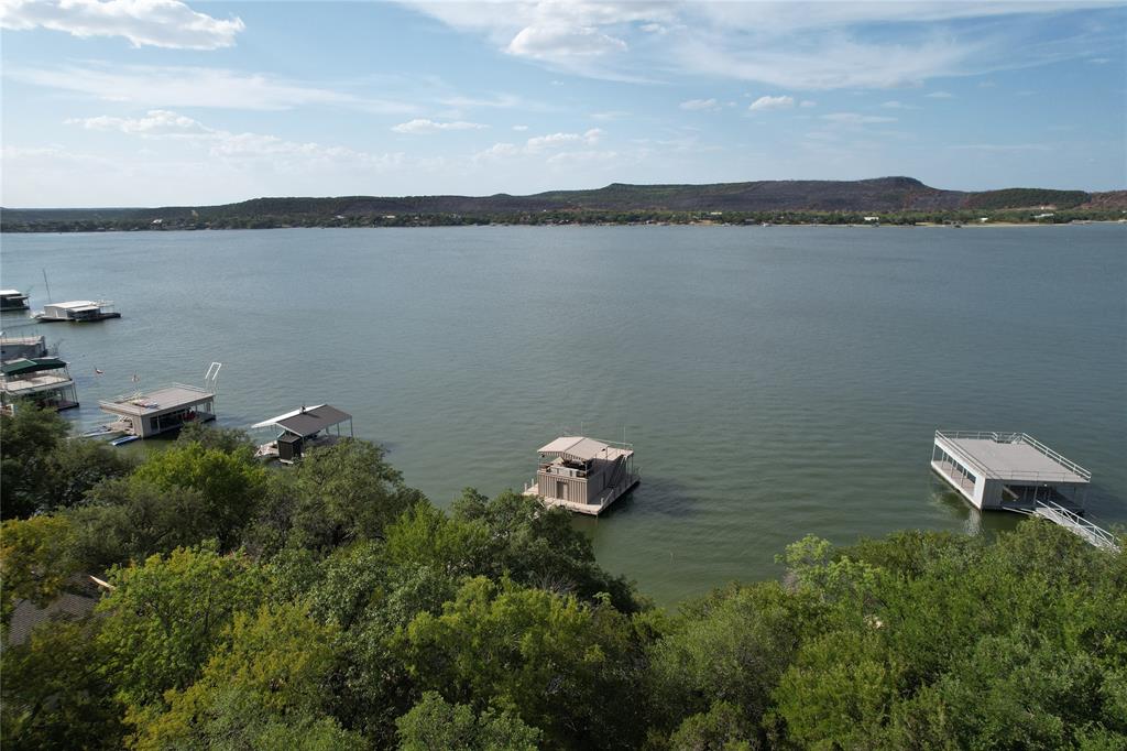 2217 Trl Rdg Road Graford, TX 76449 - Photo 6 of 9 a aerial view of a house with a lake view