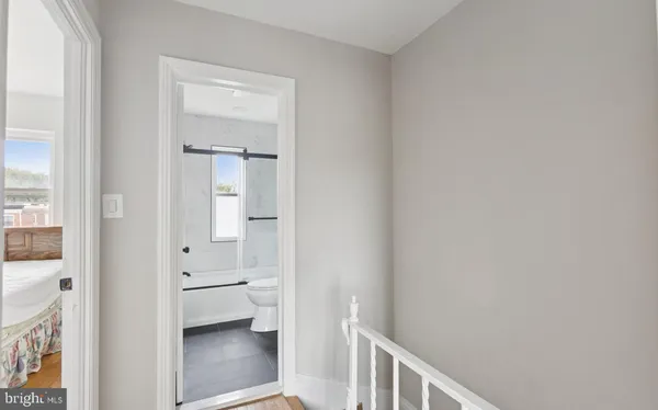 a bathroom with a toilet sink