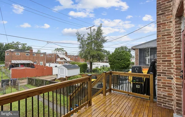 a view of a balcony with chairs