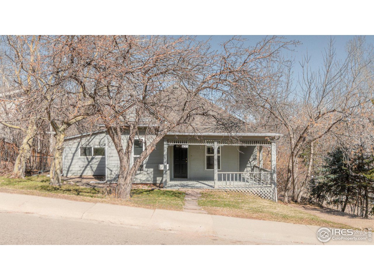 a black and white photo of a house