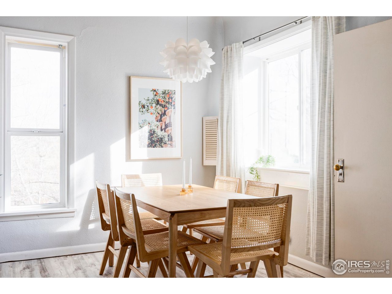 635 Alpine Avenue Boulder, CO 80304 - Photo 11 of 22 a view of a dining room with furniture and window
