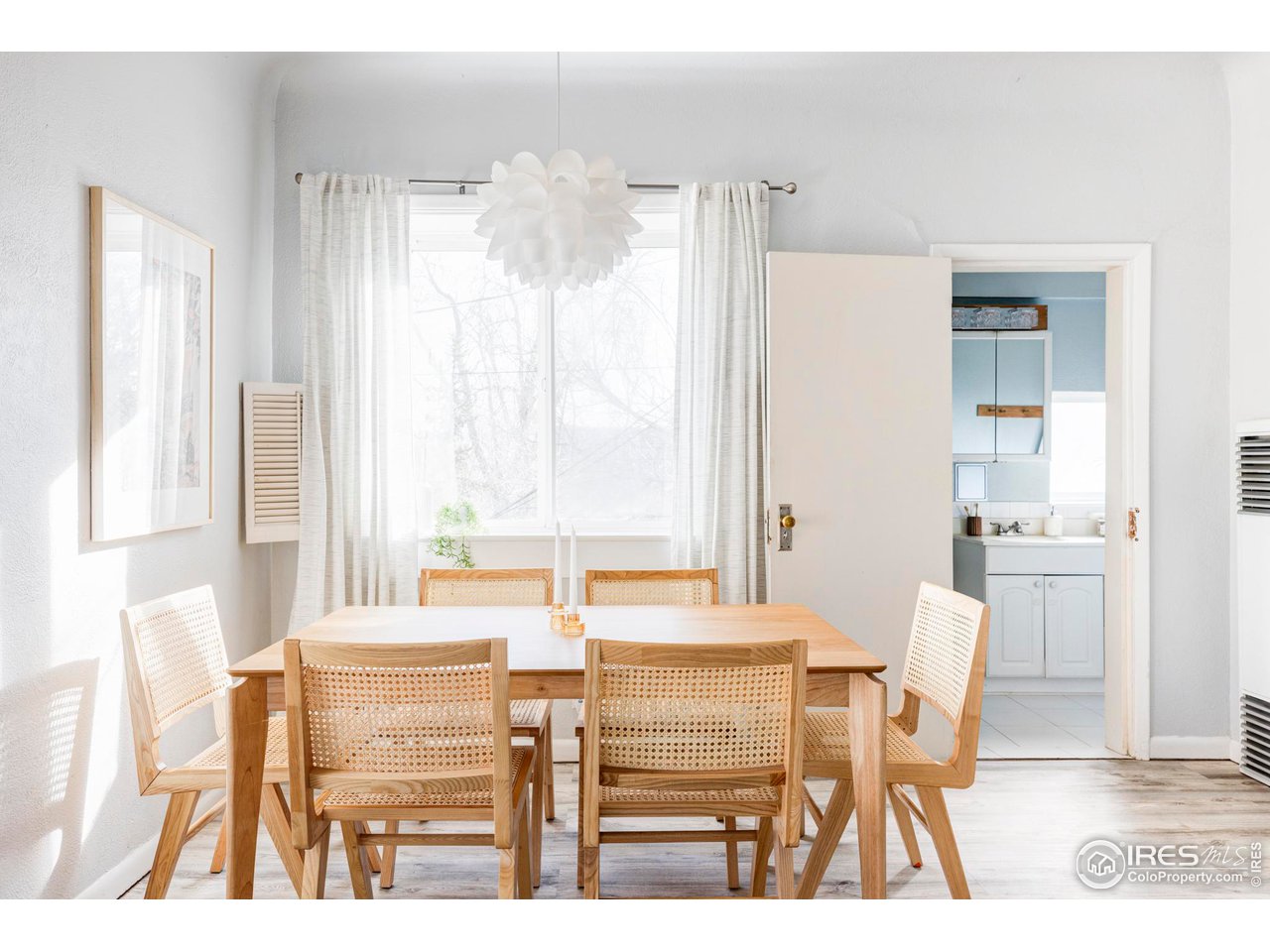 635 Alpine Avenue Boulder, CO 80304 - Photo 12 of 22 a dining room with furniture and large windows