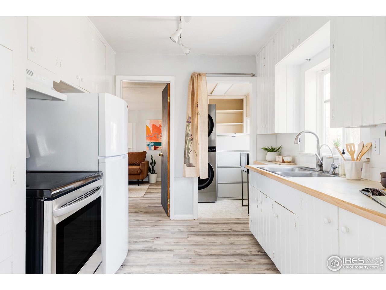 635 Alpine Avenue Boulder, CO 80304 - Photo 16 of 22 a kitchen with a sink cabinets and appliances