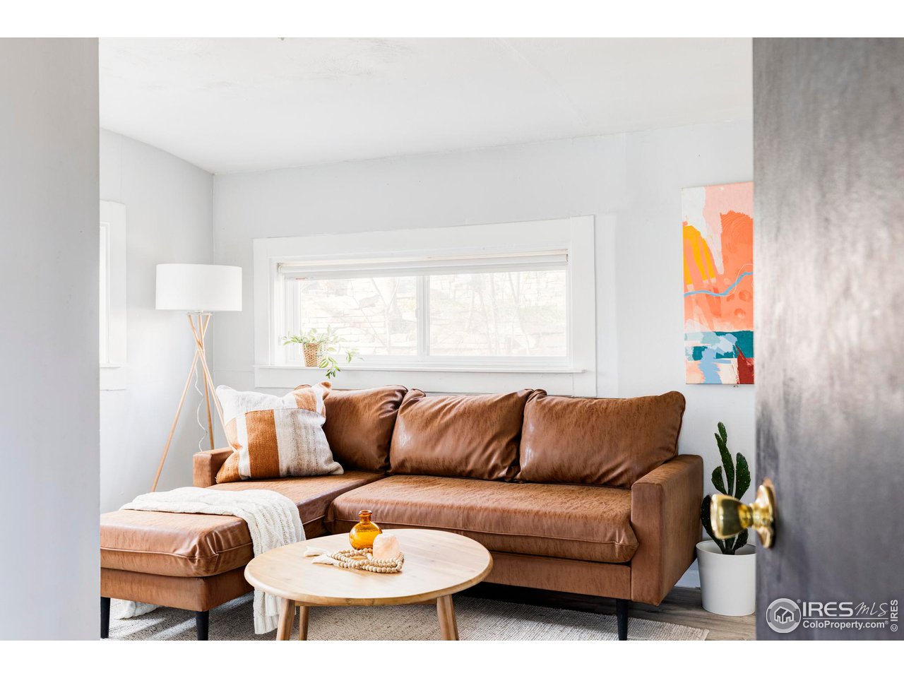 635 Alpine Avenue Boulder, CO 80304 - Photo 20 of 22 a living room with furniture and a couch
