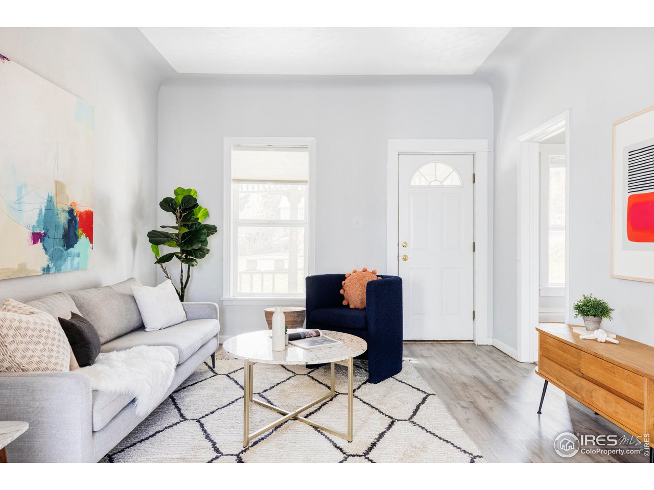 635 Alpine Avenue Boulder, CO 80304 - Photo 2 of 22 a living room with furniture and a potted plant