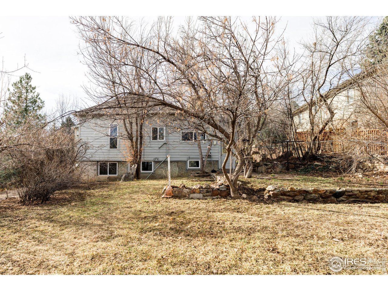 635 Alpine Avenue Boulder, CO 80304 - Photo 22 of 22 a view of a white house with a snow on the road