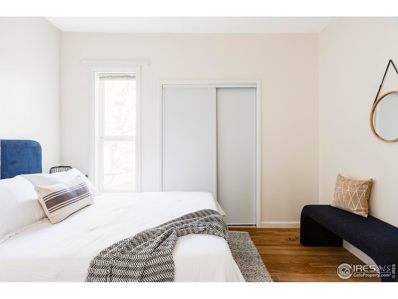 635 Alpine Avenue Boulder, CO 80304 - Photo 7 of 22 a bedroom with a bed and a window