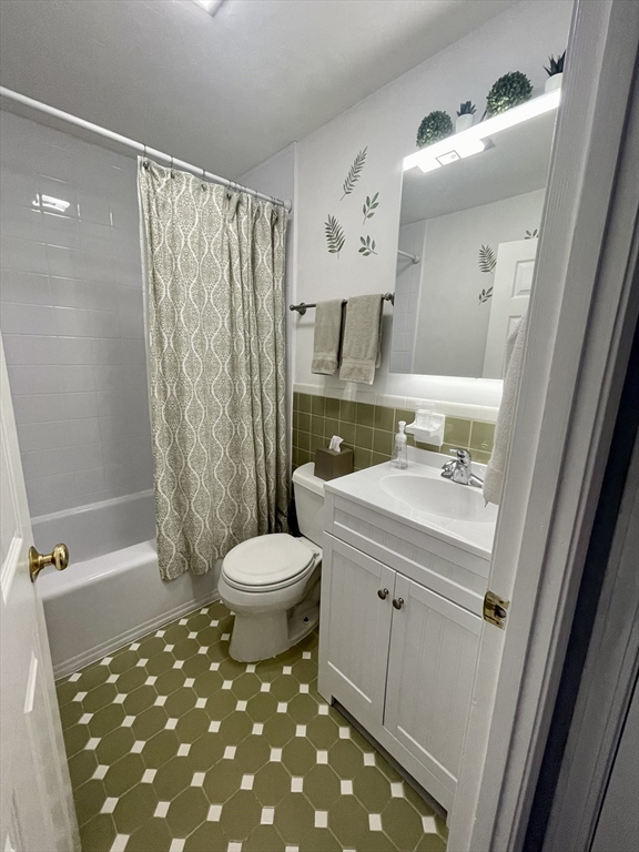 176 Maple Avenue, Unit 133 Rutland, MA 01543 - Photo 11 of 14 a bathroom with a sink toilet and shower