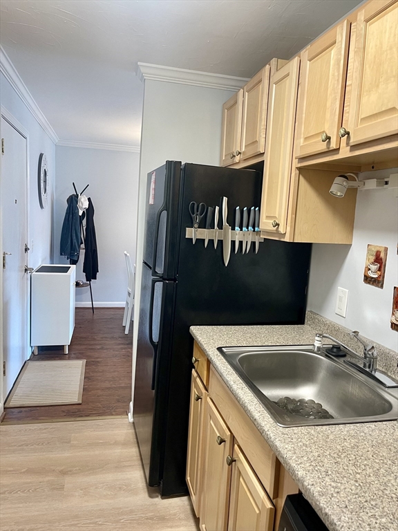 176 Maple Avenue, Unit 133 Rutland, MA 01543 - Photo 5 of 14 a kitchen with stainless steel appliances granite countertop a sink a refrigerator and a stove
