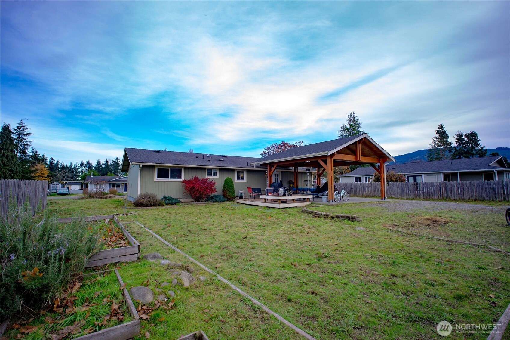 151 Valley View Drive Sequim, WA 98382 - Photo 34 of 40 a front view of a house with garden