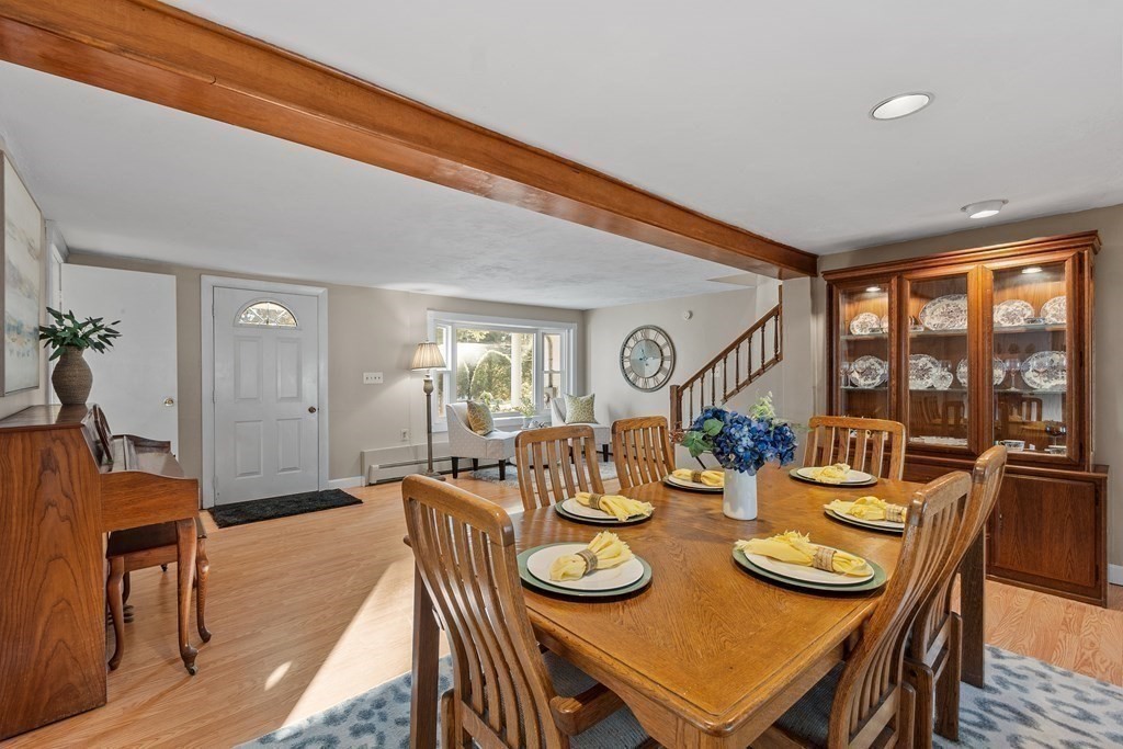 67 Pine Street Sudbury, MA 01776 - Photo 16 of 41 a view of a dining room with furniture window and outside view