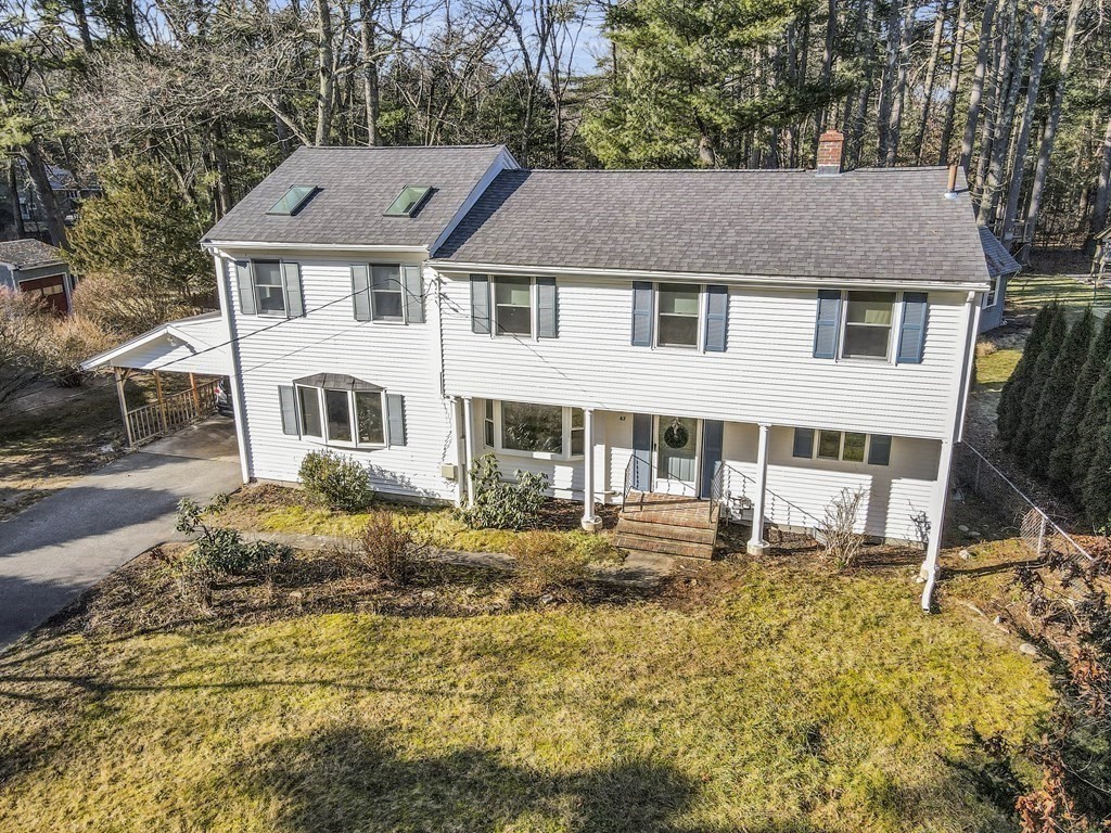 67 Pine Street Sudbury, MA 01776 - Photo 2 of 41 a aerial view of a house